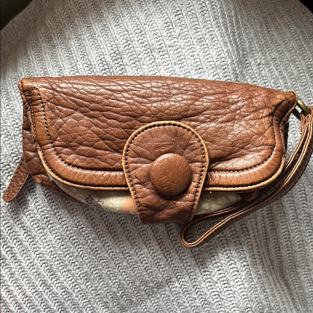 Cute Nica wristlet purse multiple zipped areas. Vegan leather. Like new.
